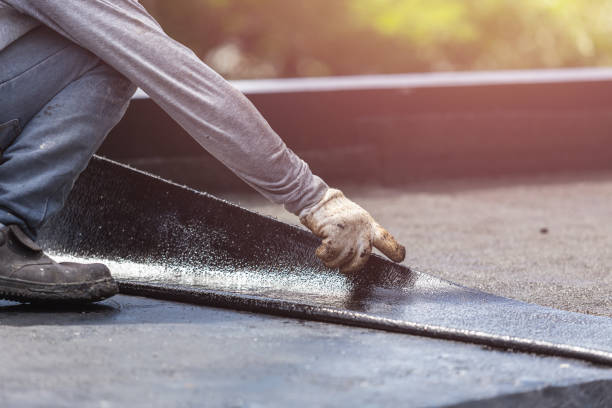 Professional Waterproofing technician working in Charlotte, MI